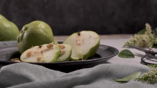 Metal plate with delicious ripe pears on table. - Metraje, vídeo