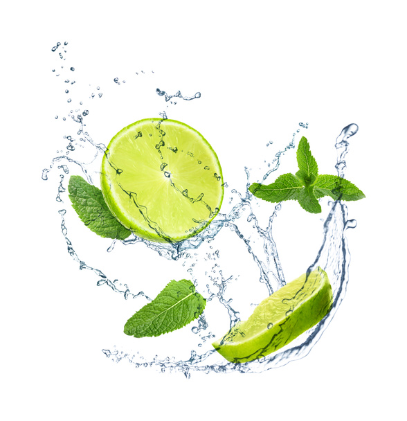 Slices of juicy lime, fresh mint and splashing cold water on white background - Valokuva, kuva