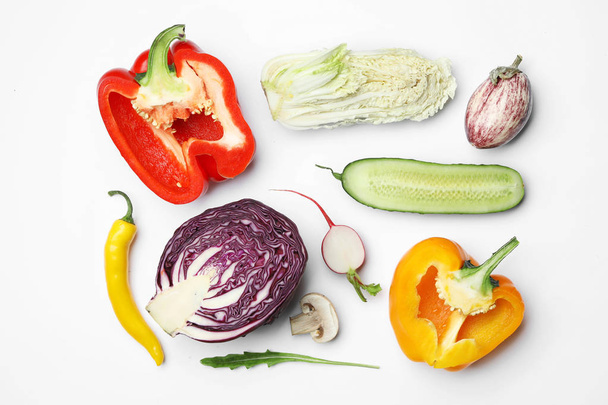 Flat lay composition with fresh ripe vegetables on white background - Fotoğraf, Görsel
