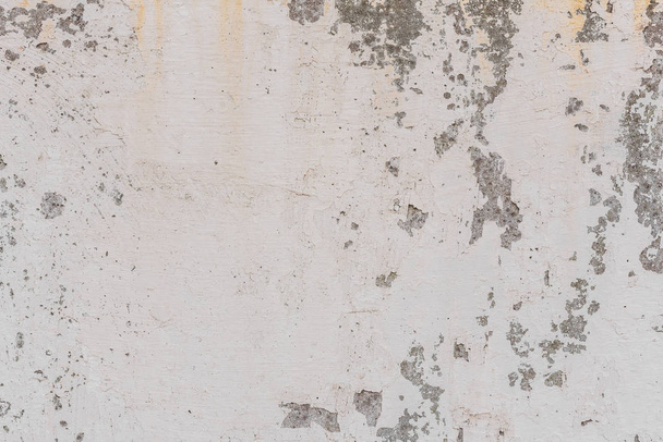 Текстура, стена, бетон, его можно использовать в качестве фона. Фрагмент стены с царапинами и трещинами - Фото, изображение