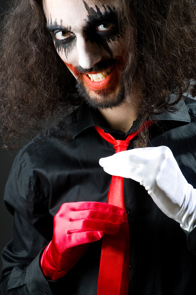 Joker personnification avec l'homme dans la chambre noire
 - Photo, image