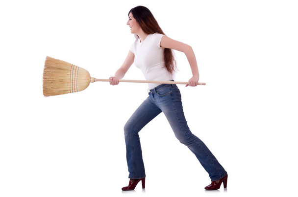 Young woman with broom isolated on white - Фото, зображення