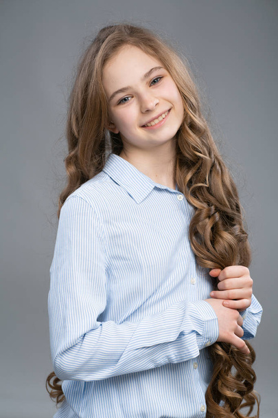 Beautiful  young business girl with long hair - Valokuva, kuva
