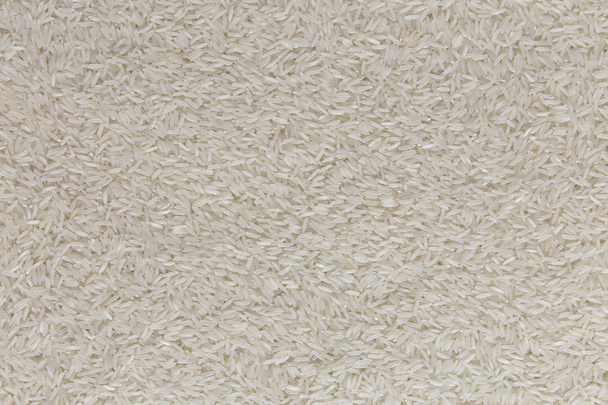 Dry white rice basmati, top view. Flat lay, overhead, from above - Foto, Imagem