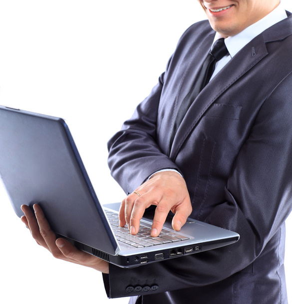 Businessman with a laptop. - Фото, зображення