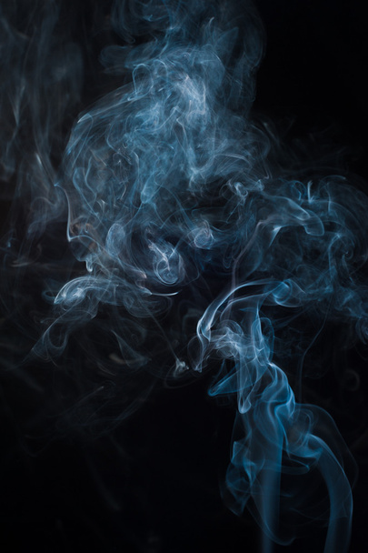 Moving smoke on a black background - Photo, image