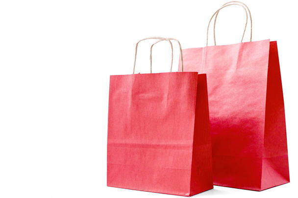 environmentally friendly cardboard red bags on white isolated ba - Photo, Image