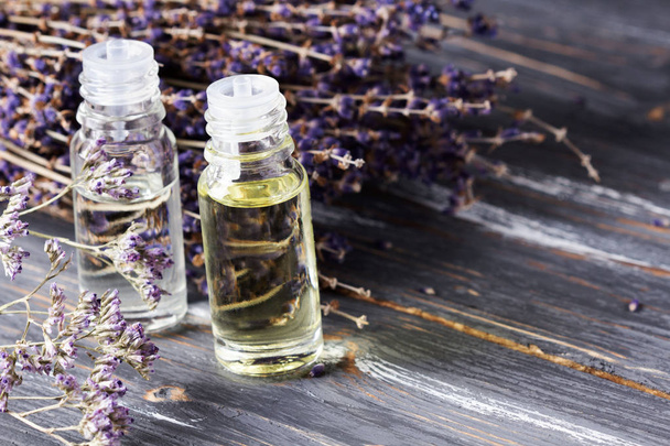 Lavender flowers and herbal oil. Selective focus. - Photo, Image