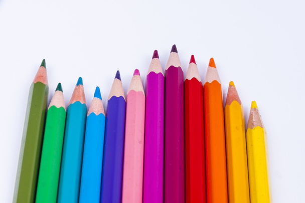 Colourful crayons on white background. - Foto, Imagen