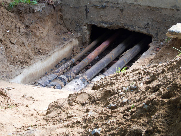 Repair of water supply pipelines in the basement of the house - Photo, Image