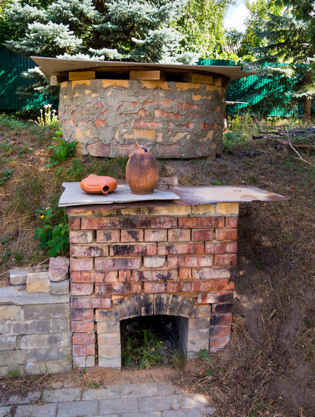 Homemade brick oven for burning pottery in the yard - Photo, Image