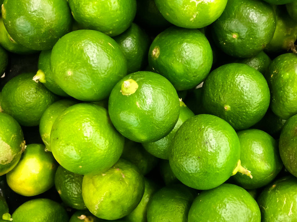 Limões verdes fundo, Frutas no mercado
. - Foto, Imagem