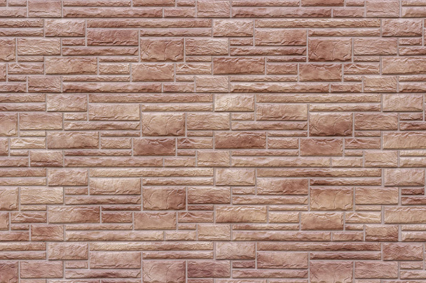 Decorative brown brick wall as background or texture. - Zdjęcie, obraz