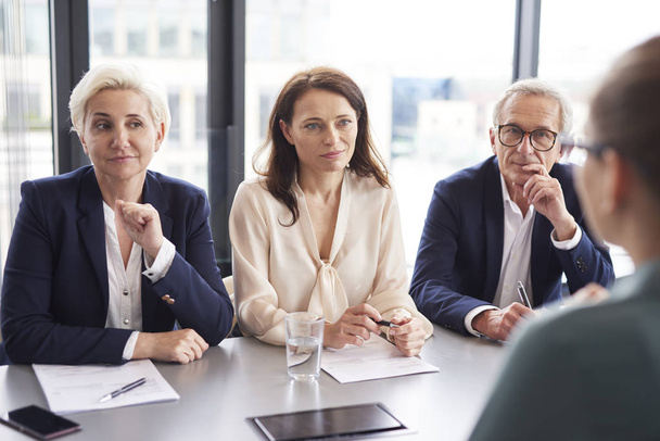 Business people having a conversation at conference table  - Photo, Image