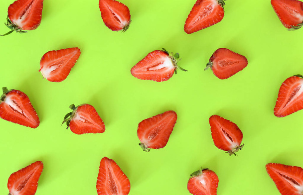 Strawberries pattern close up. Bright pattern of fresh strawberries on background. Top view, flat lay. - Photo, Image