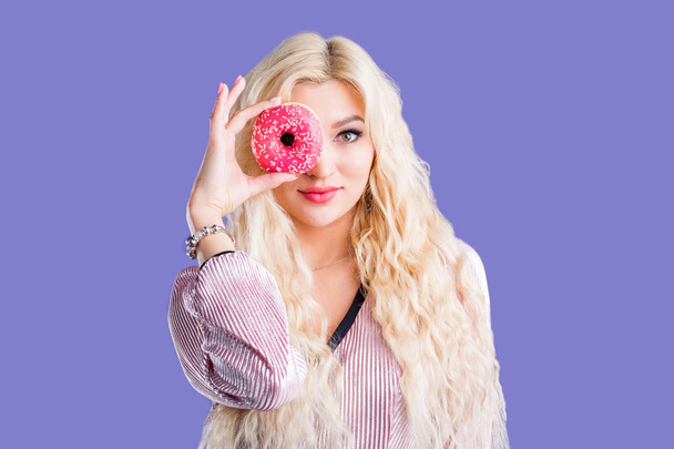 Photo of female holds sweet delicious doughnut - Foto, Imagem