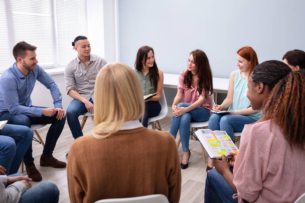 Group Of Multi-ethnic Friend Having Group Discussion - Фото, зображення