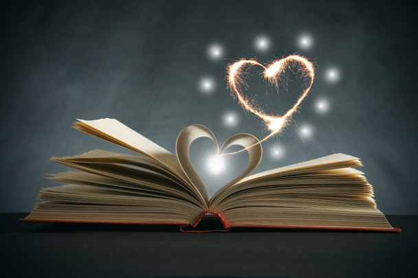 Pages of a book curved into a heart shape - Photo, Image