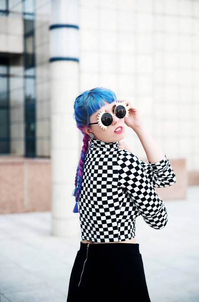Portrait of beautiful young woman with blue hair - Foto, Imagem