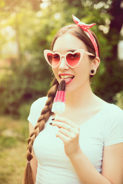 Young woman posing with ice cream  - Φωτογραφία, εικόνα