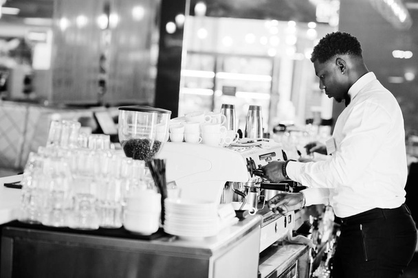 African american bartender barista at bar preparing coffee. - Fotografie, Obrázek