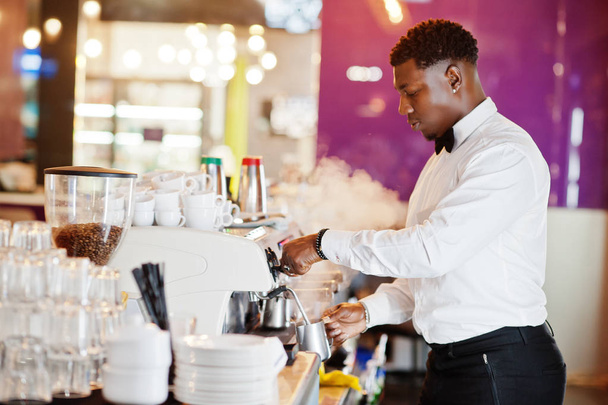 African american bartender barista at bar preparing coffee. - Foto, Bild