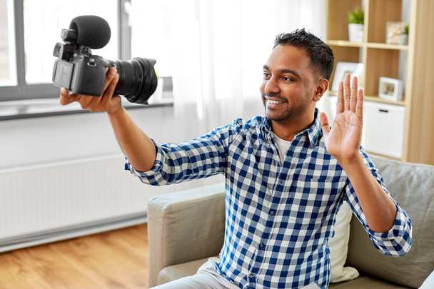 male video blogger with camera blogging at home - Foto, Imagem