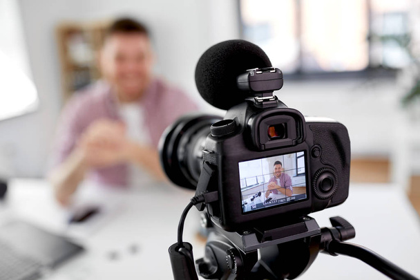 close up of camera recording male video blogger - Zdjęcie, obraz