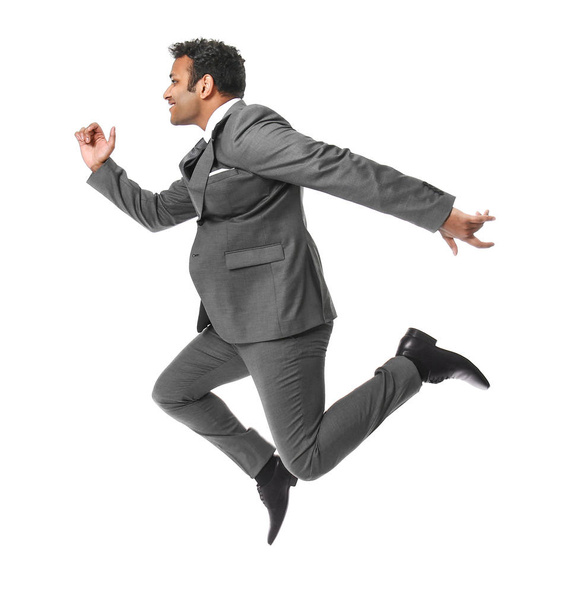 Jumping businessman on white background - Фото, зображення