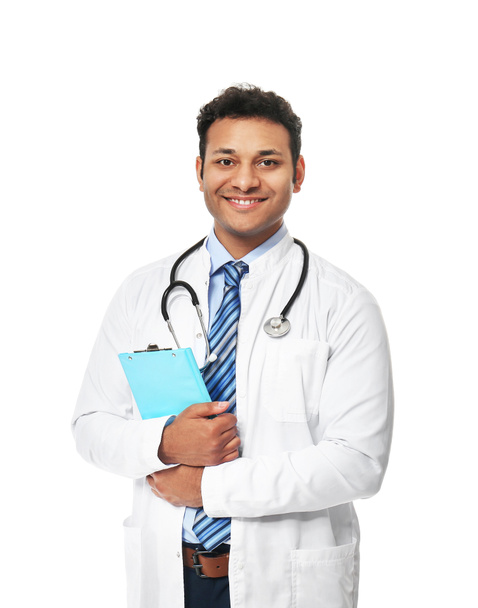 Knappe mannelijke arts op witte achtergrond - Foto, afbeelding