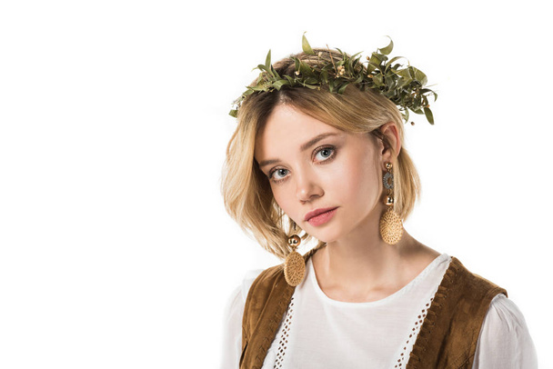 pretty hippie girl wearing earrings and wreath isolated on white - Photo, image