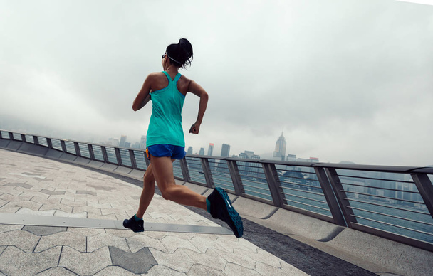 Healthy lifestyle, woman running in hong kong  - Φωτογραφία, εικόνα