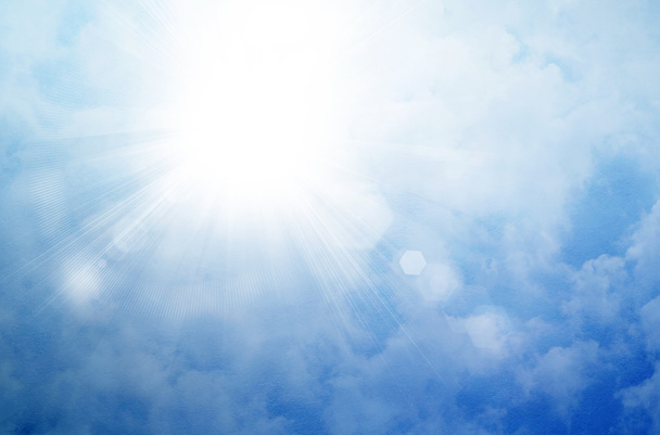 Sun on a blue sky with rays and flare, abstract background - Photo, Image