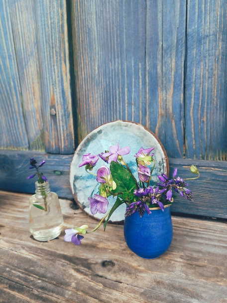 field purple flowers in blue vase - Zdjęcie, obraz
