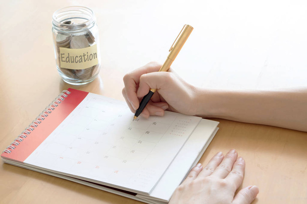 Hand writing in calendar education plan concept. - Foto, Bild