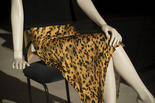 closeup of yellow and black leopard printed skirt on mannequin   - Foto, imagen