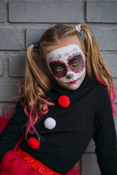 Child looking at camera , dressed in costume for Halloween party. - Photo, Image