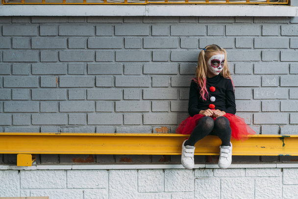 Child looking at camera , dressed in costume for Halloween party - Photo, Image