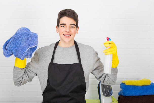man with household and household cleaning products - Photo, Image