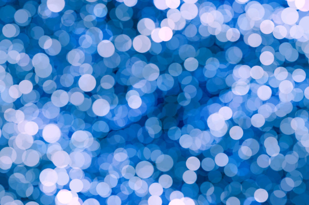 Ragyogó kék háttér bokeh. Élénk színű buborékok. - Fotó, kép
