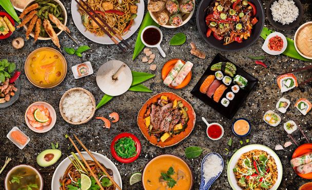 Asian food background with various ingredients on rustic stone background , top view. - Фото, зображення