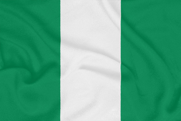 Прапор Нігерії з фактурної тканини. Патріотичний символ - Фото, зображення