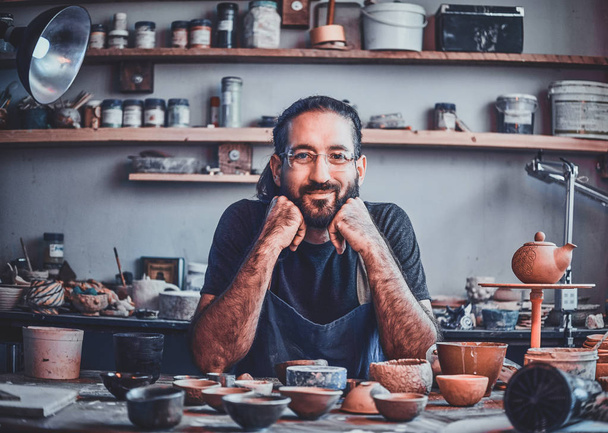 Talented artist at his own pottery studio is workig for new project. - Photo, Image