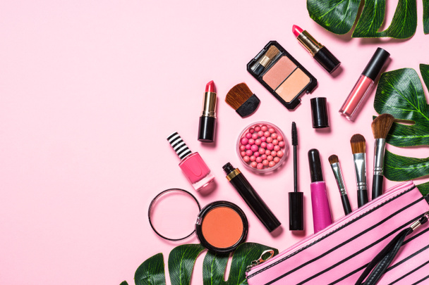 Makeup professional cosmetics on pink background. - Photo, Image