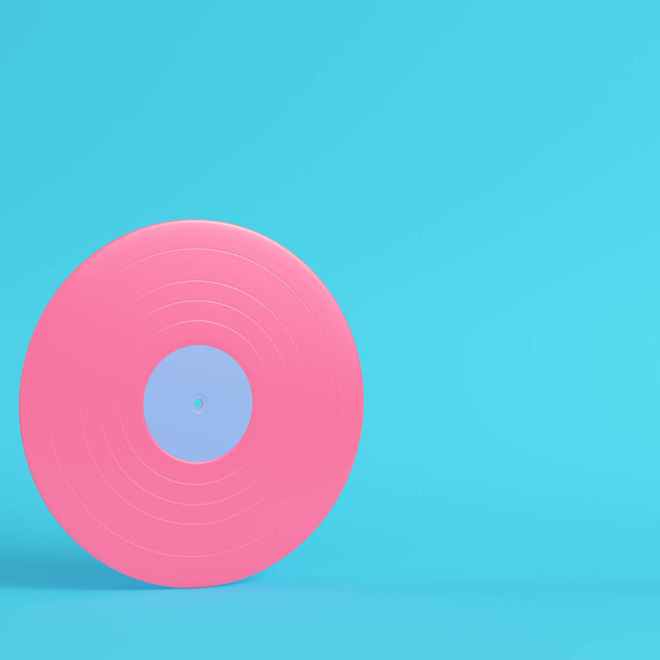 Vinyl record on bright blue background in pastel colors. Minimal - Photo, Image