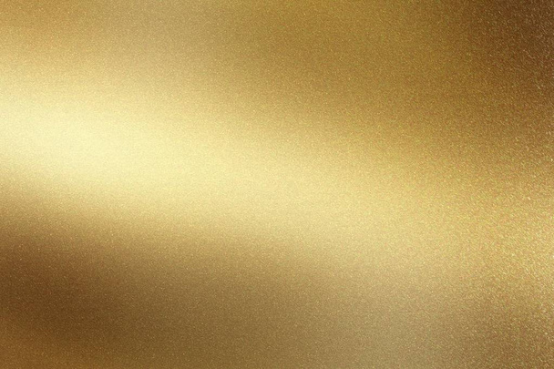 Glowing polished golden metal wall surface, abstract texture background - Photo, Image