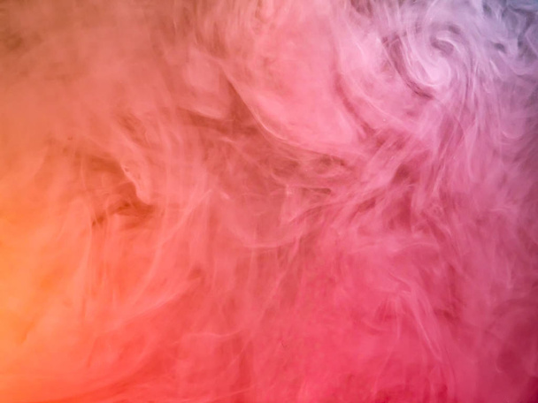 Pink acrylic paint cloud, close up view. Blurred background. Ink dropped into water, abstract background. Acrylic smoke under water, abstract pattern. Abstract art background for wallpapers. - Foto, immagini