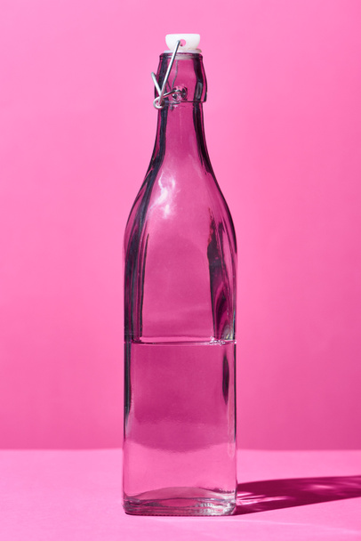 transparent bottle with water on pink background - Photo, Image