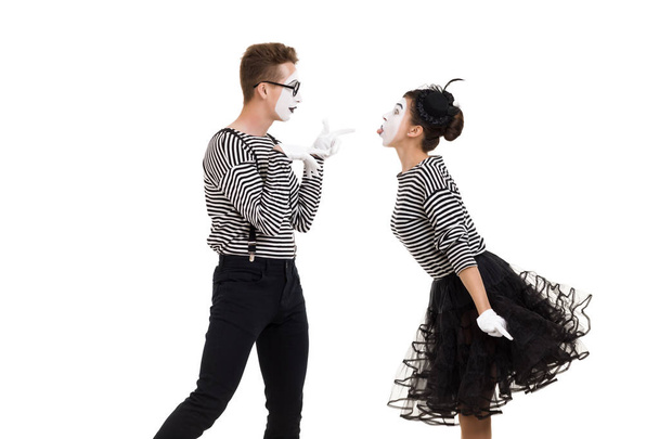 Smiling mimes in striped shirts. - Foto, afbeelding