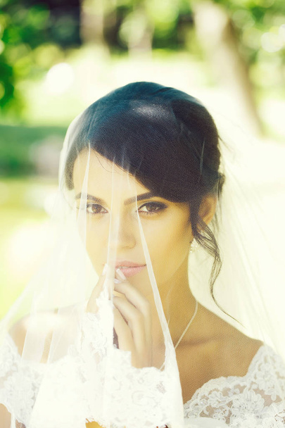 pretty bride under veil - Fotó, kép